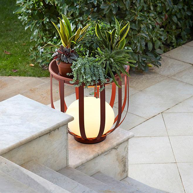 Bols outdoor floor lamp short in red finish on steps