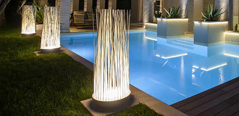Don't Touch outdoor floor lamps by small outdoor pool