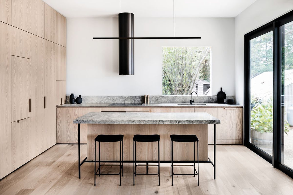Highline Linear Pendant Black over Kitchen Island with Grey Marble Island