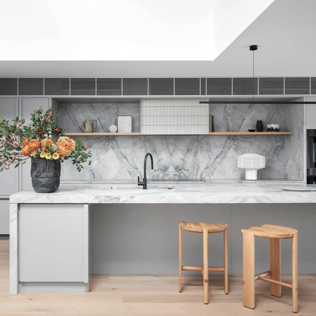 Highline Linear Pendant in Black over Kitchen Island with Sky Light