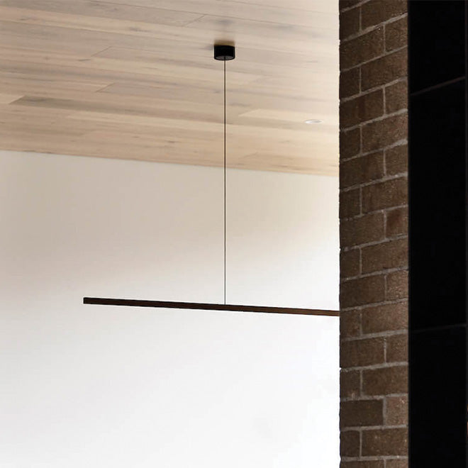 Highline Linear Pendant in Black with Black Canopy on Wooden Ceiling